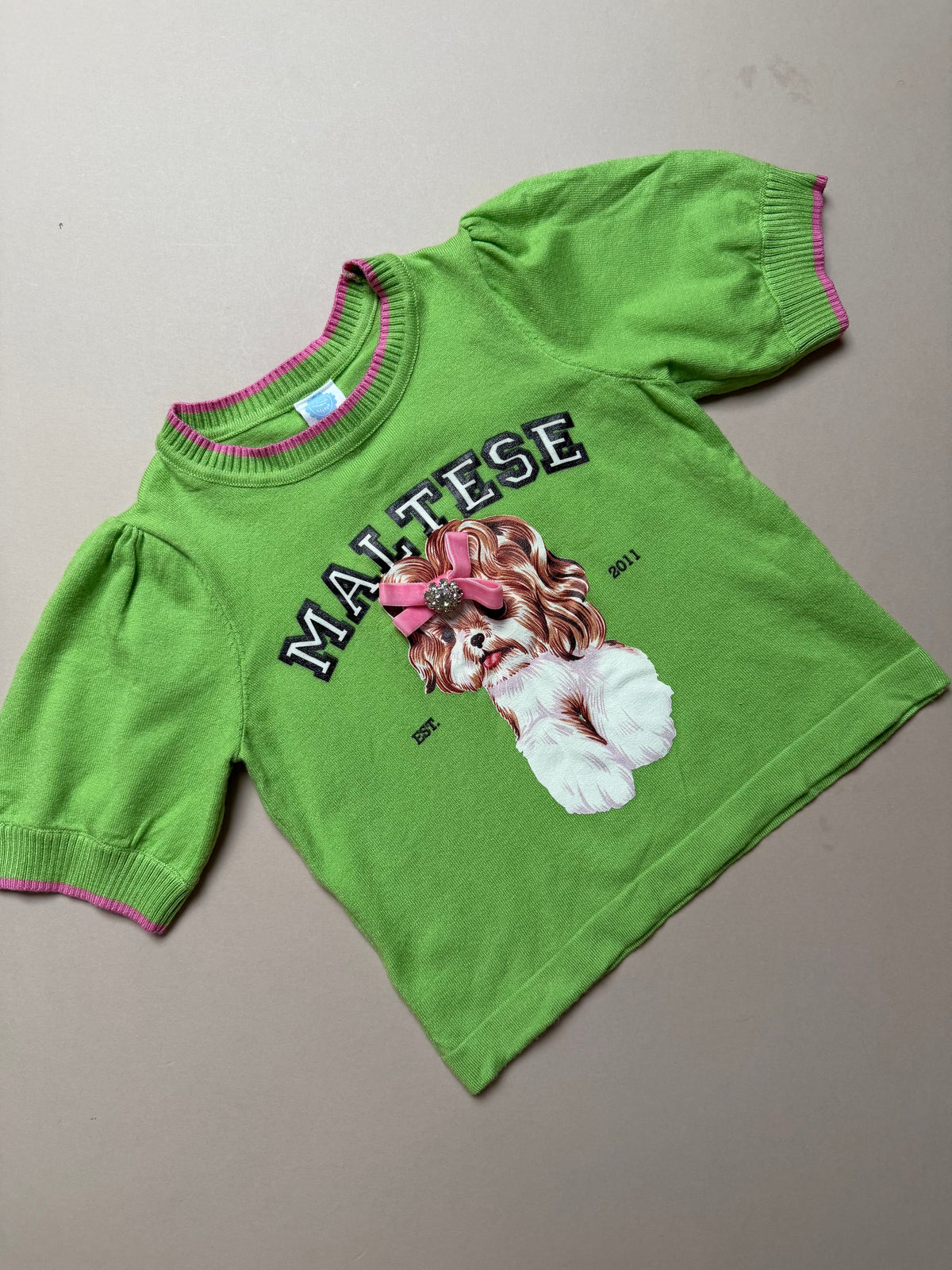 Bold Apple Green Maltese Dog Slogan Knitted Short Sleeved Jumper With Pink Stitching in Age 6