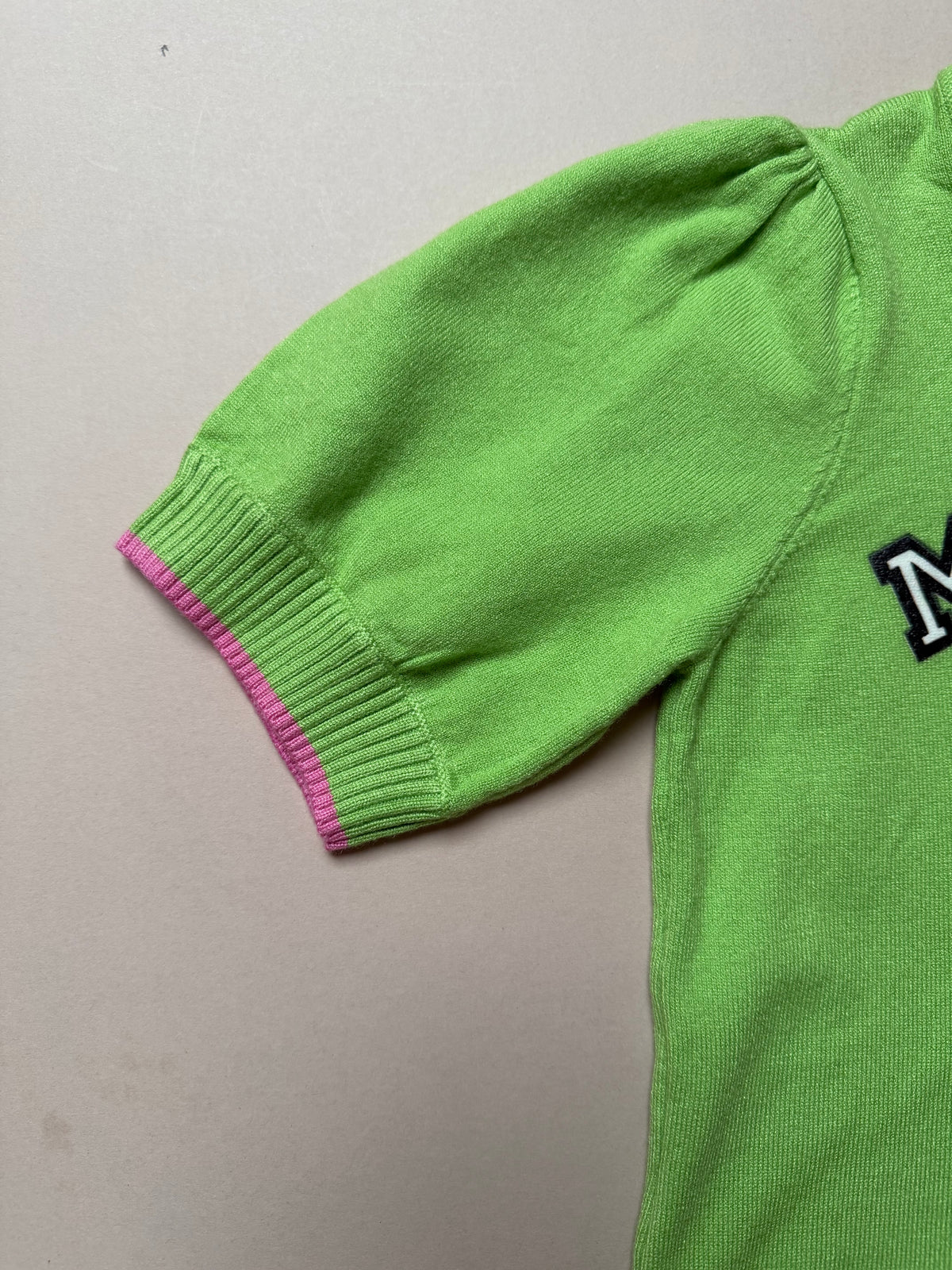 Bold Apple Green Maltese Dog Slogan Knitted Short Sleeved Jumper With Pink Stitching in Age 6