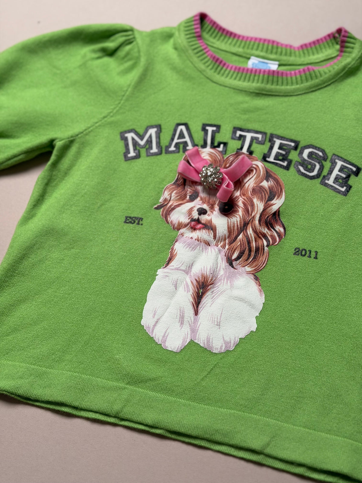 Bold Apple Green Maltese Dog Slogan Knitted Short Sleeved Jumper With Pink Stitching in Age 6