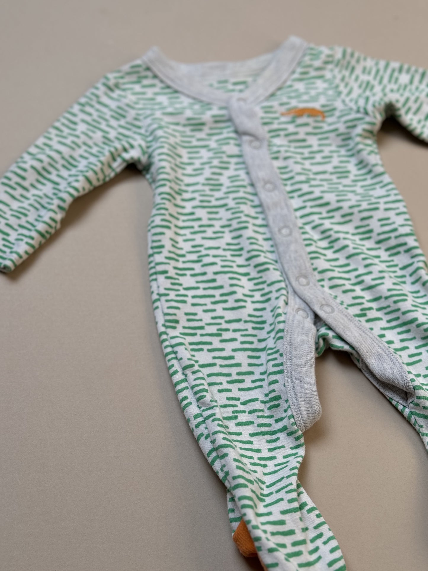 Marks & Spencer Crocodile Long Sleeved Onesie in Newborn