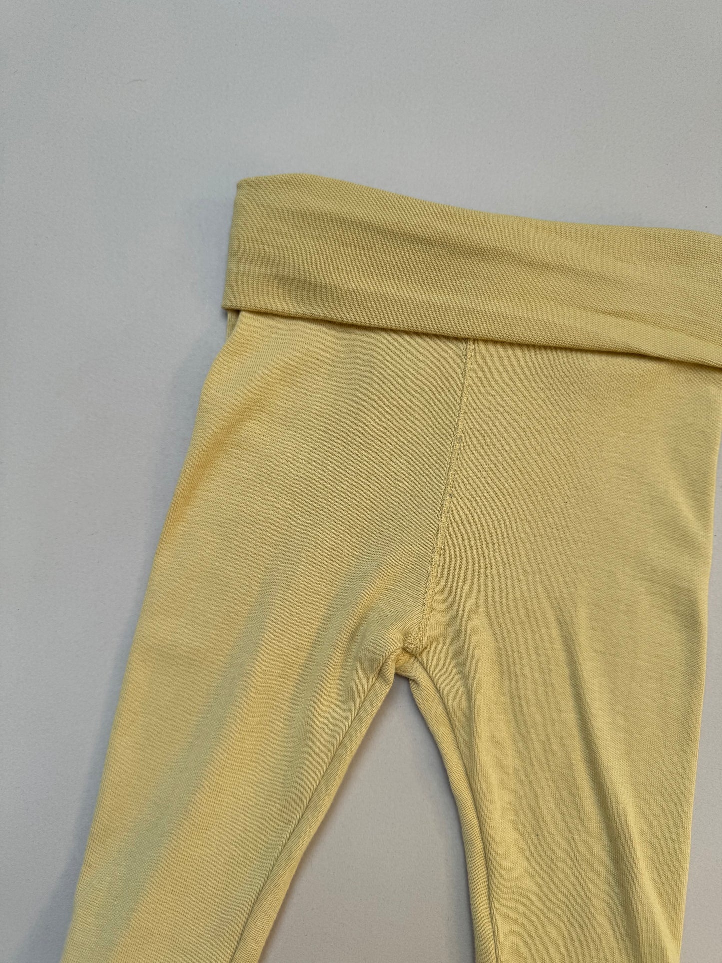 H&M Mustard Leggings With Feet in 2-4 Months